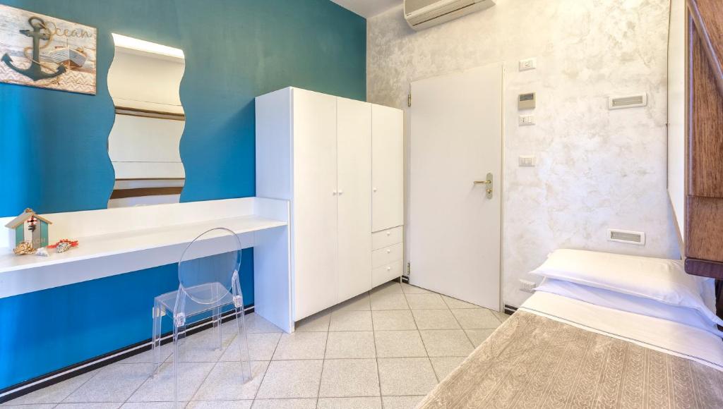 Postel nebo postele na pokoji v ubytování Hotel La Nidiola