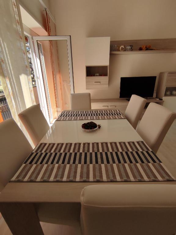 A bed or beds in a room at LA CASA DEI NONNI