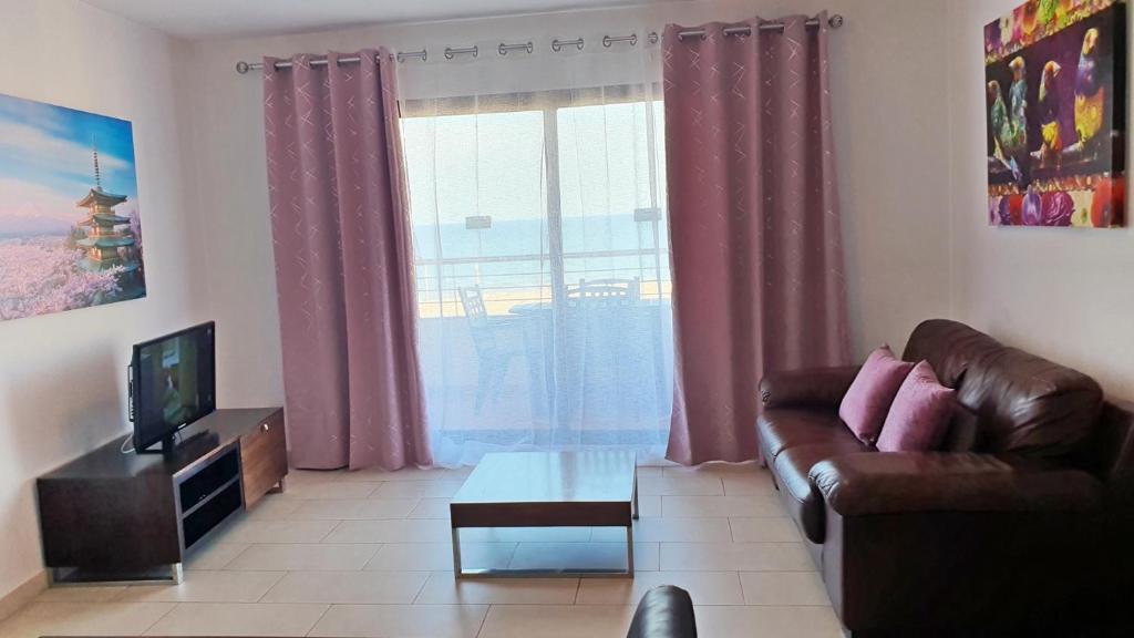 Televízia a/alebo spoločenská miestnosť v ubytovaní DON XIMO GANDIA - Alquiler solo familias