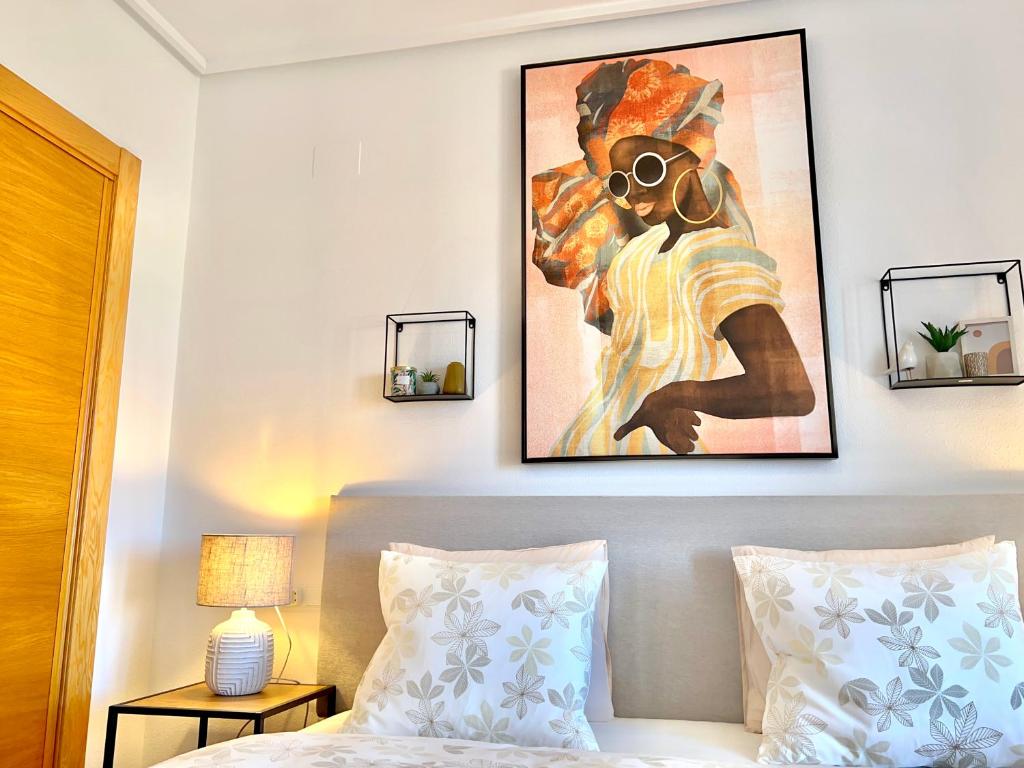 Postel nebo postele na pokoji v ubytování Casa Hacienda Riquelme Golf Resort