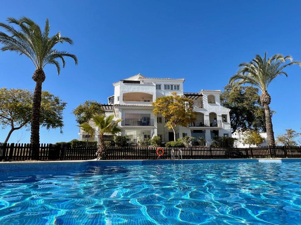 Bazén v ubytování Casa Hacienda Riquelme Golf Resort nebo v jeho okolí