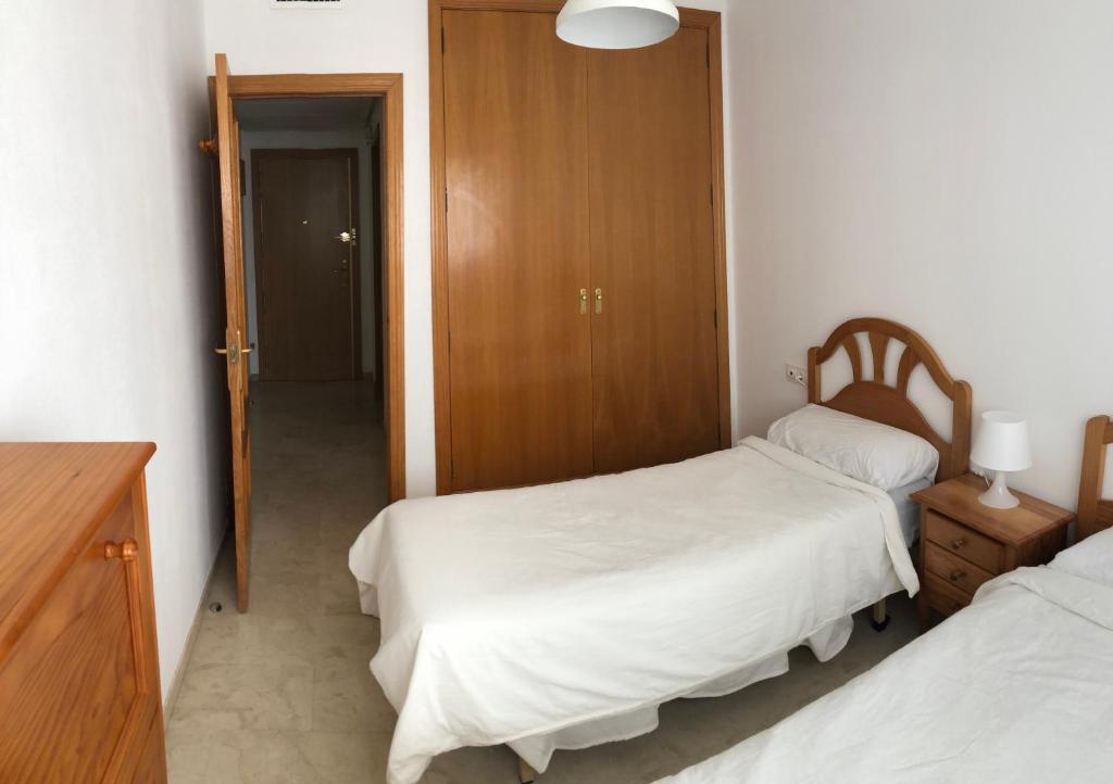 Posteľ alebo postele v izbe v ubytovaní Apartamento de vacaciones en Gemelos 22 T1 Benidorm