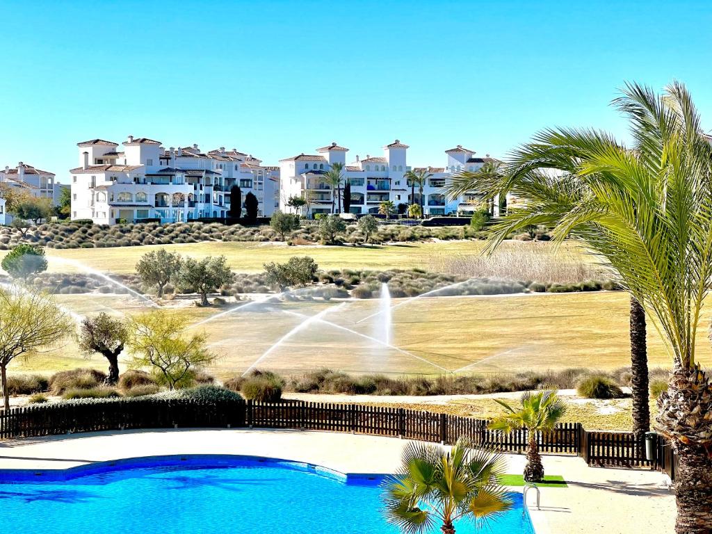 Bazén v ubytování Casa Hacienda Riquelme Golf Resort nebo v jeho okolí