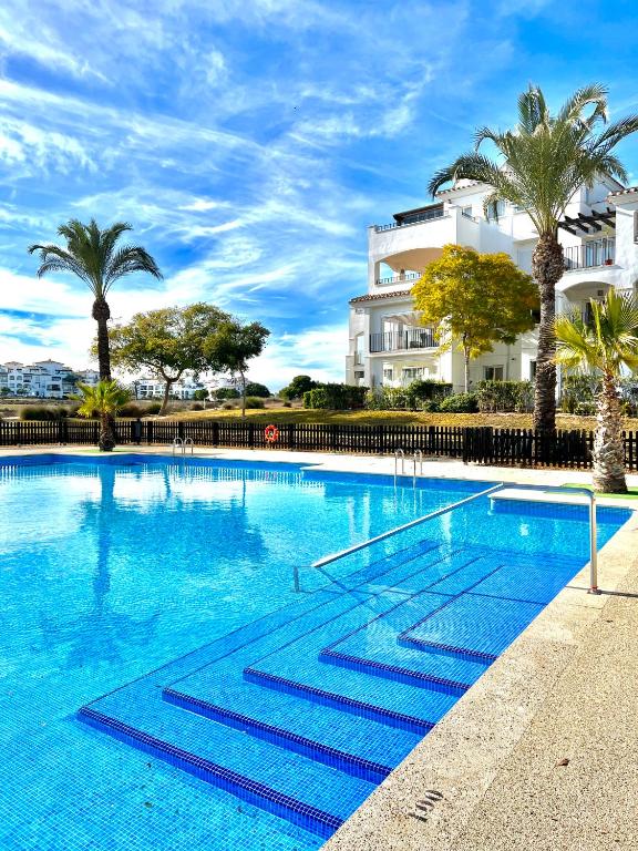 Bazén v ubytování Casa Hacienda Riquelme Golf Resort nebo v jeho okolí