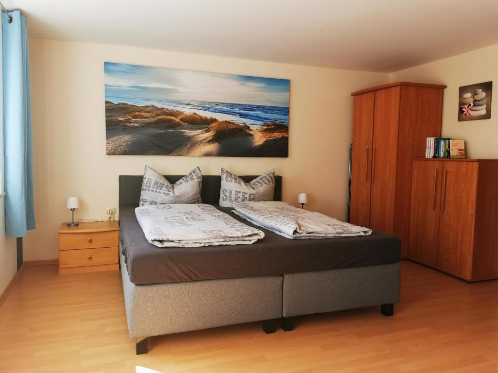 Postel nebo postele na pokoji v ubytování Ferienhäuser Steffi und Ruth
