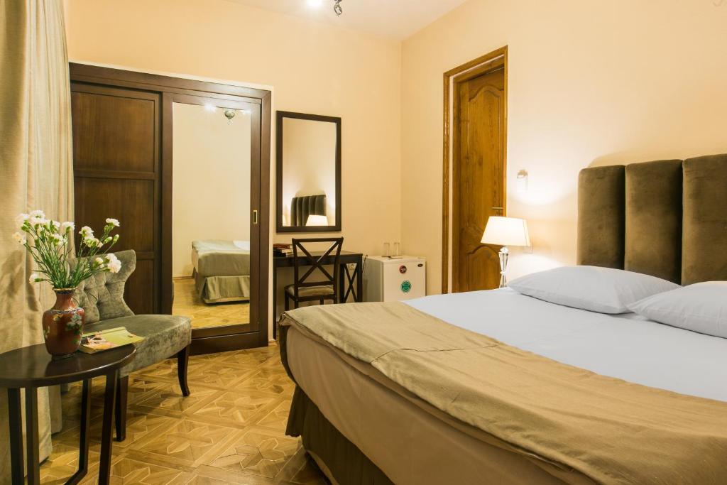 Postel nebo postele na pokoji v ubytování Hotel VIP