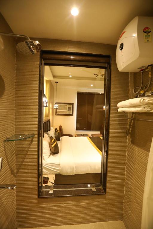 Postel nebo postele na pokoji v ubytování Hotel D SilverLeaf