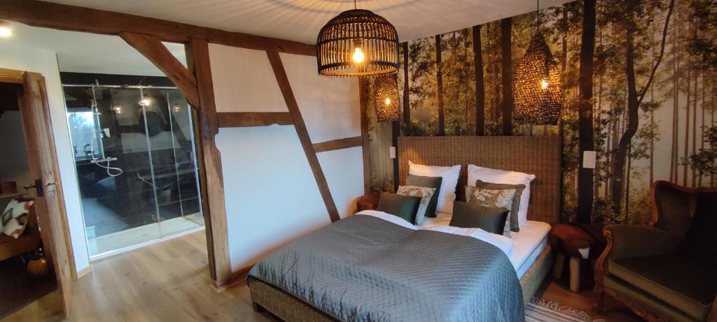 Postel nebo postele na pokoji v ubytování B&B La Bouverie HF