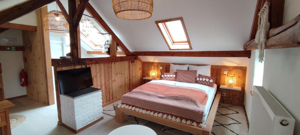 Postel nebo postele na pokoji v ubytování B&B La Bouverie HF