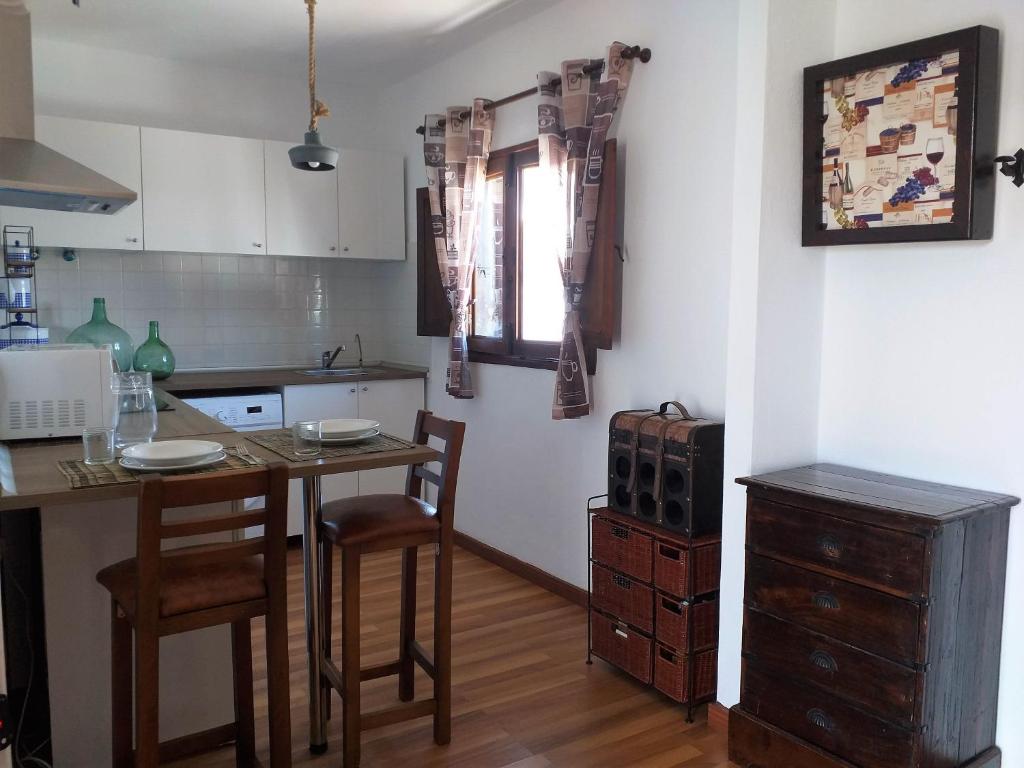 A kitchen or kitchenette at Las Casitas Masdache