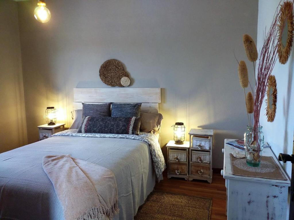 A bed or beds in a room at Las Casitas Masdache