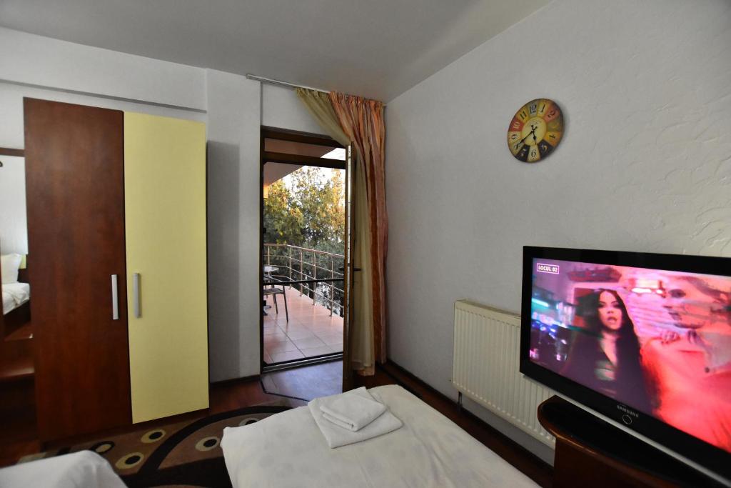 TV a/nebo společenská místnost v ubytování Hotel Euphoria