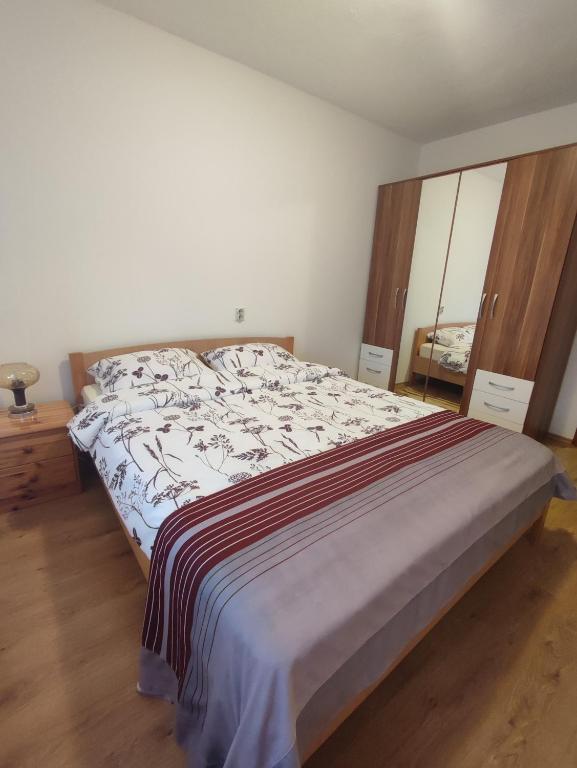 Postel nebo postele na pokoji v ubytování Apartman Adna