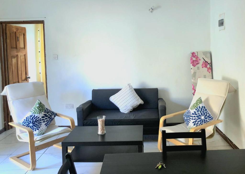 Posezení v ubytování Bay View Apartment 4 - Canouan Island