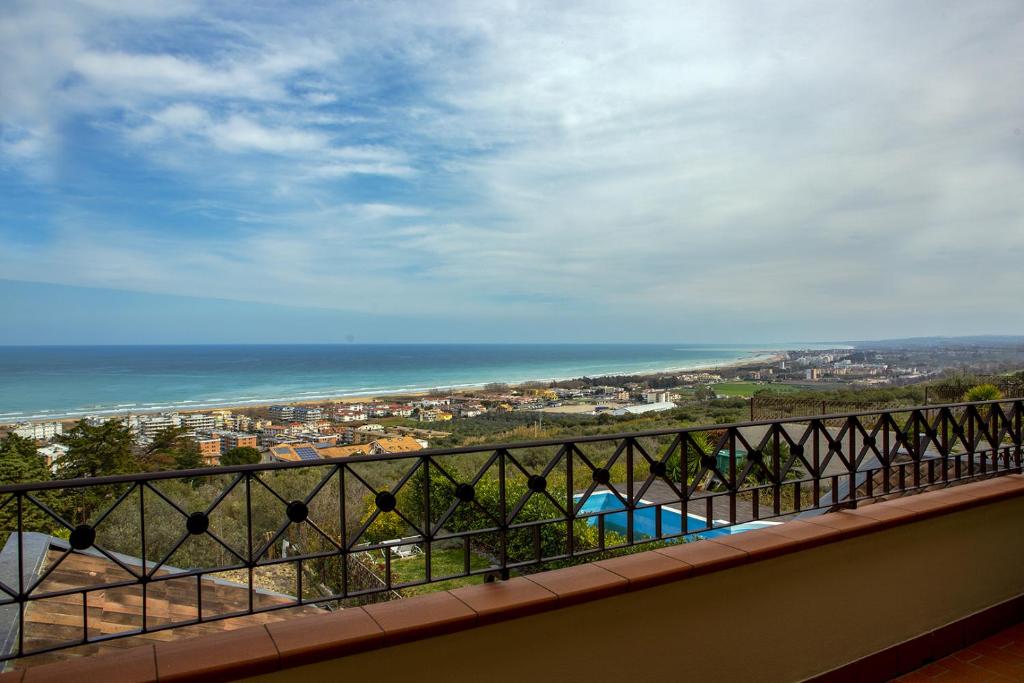 a view of the ocean from a balcony at GIUVRA Panoramic House in Vasto