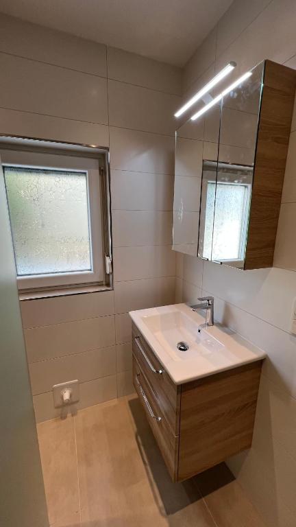 Kúpeľňa v ubytovaní Ferienhaus Traunsteinblick