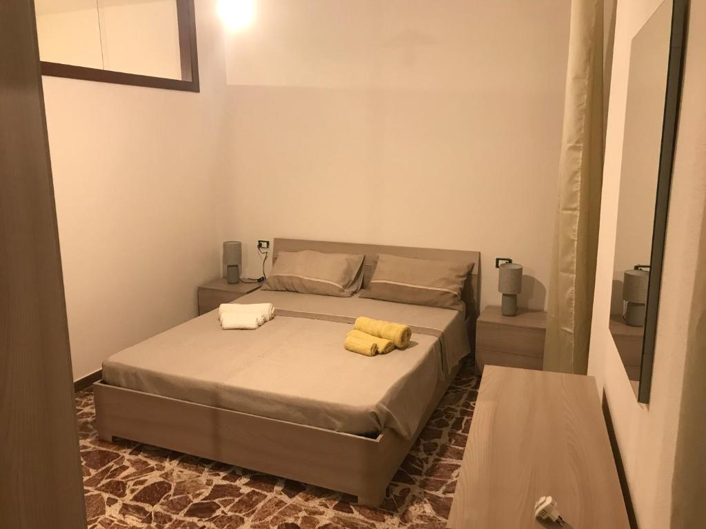 A bed or beds in a room at Da Piero e Lidia