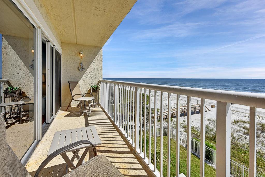 a balcony with a view of the beach at Beachdrifter 406 in Jacksonville Beach