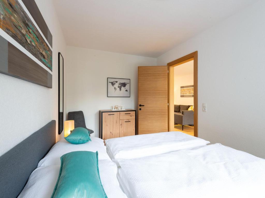 Postel nebo postele na pokoji v ubytování Apartment Alpenherz