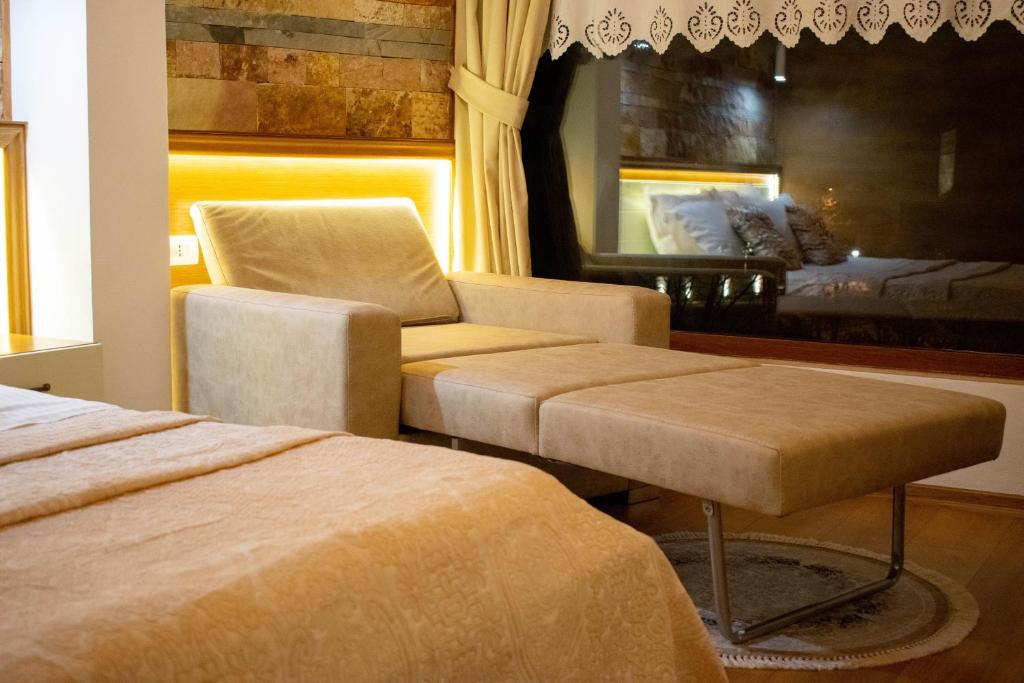 Postel nebo postele na pokoji v ubytování Te Kalaja Rooms