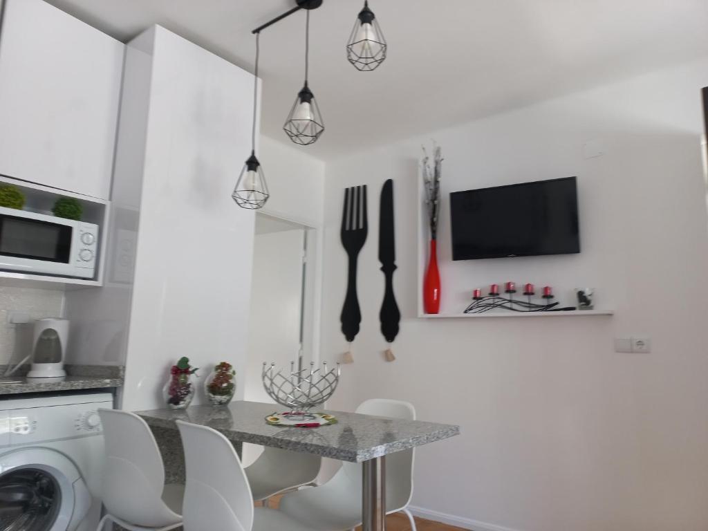 Kuchyň nebo kuchyňský kout v ubytování Apartamentos Bela Vista