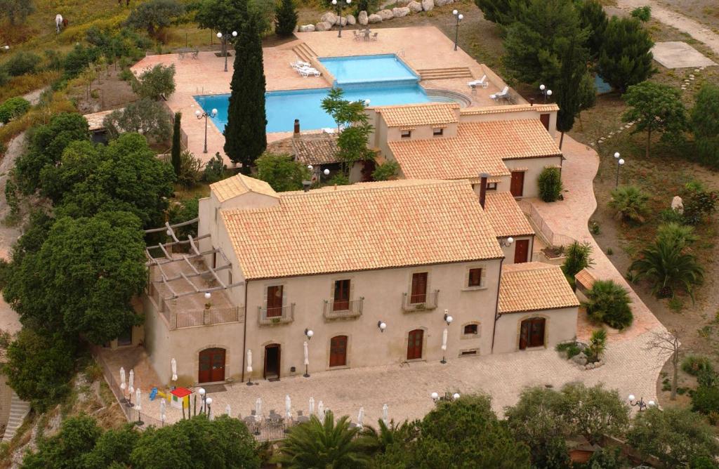 an aerial view of a house with a swimming pool at Villa Tasca in Caltagirone