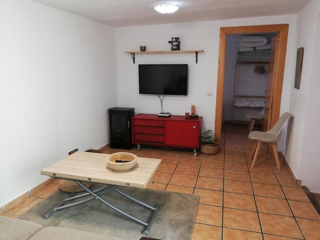 Televízia a/alebo spoločenská miestnosť v ubytovaní La buganvilla de Juana y Antonio