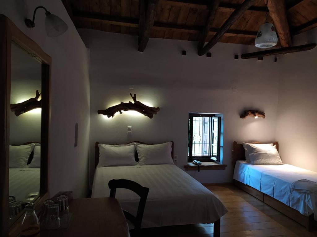 Postel nebo postele na pokoji v ubytování Sabouko Guest House