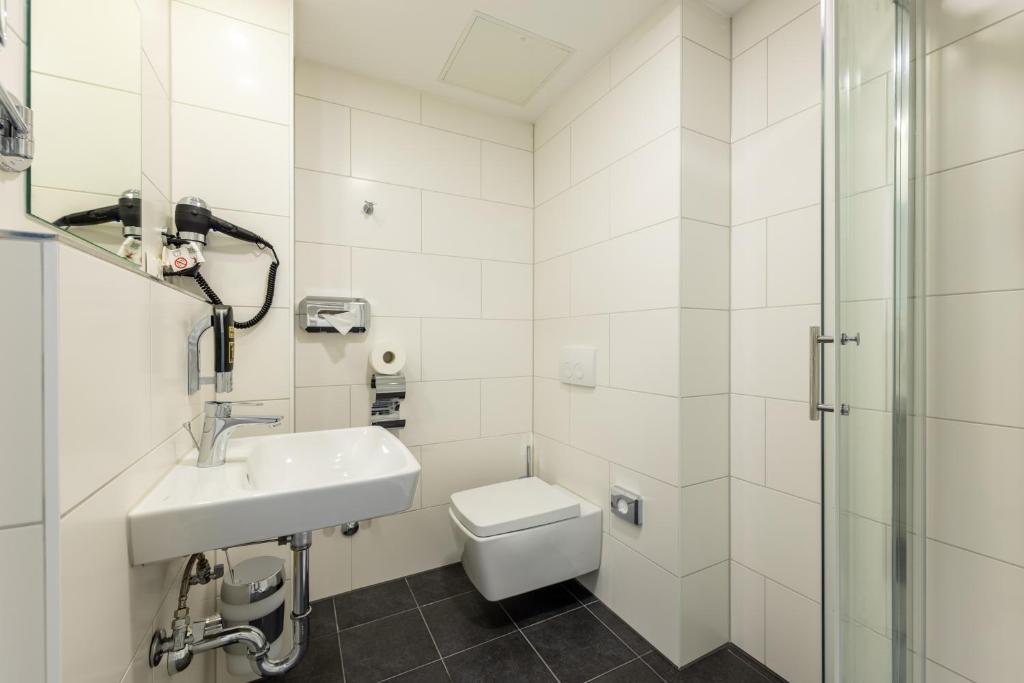 Ein Badezimmer in der Unterkunft Trip Inn Hotel Münster City