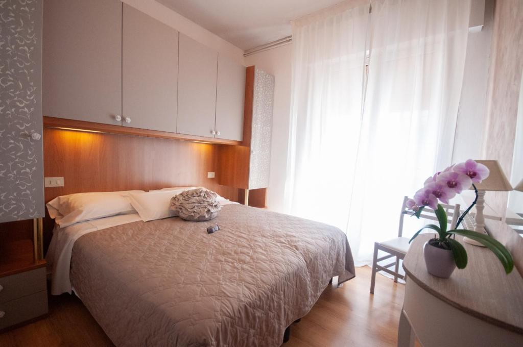 Postel nebo postele na pokoji v ubytování Hotel Crystal