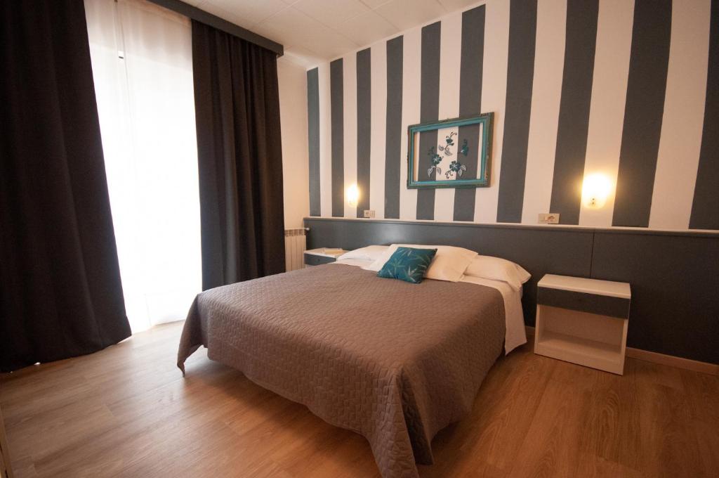 Postel nebo postele na pokoji v ubytování Hotel Crystal