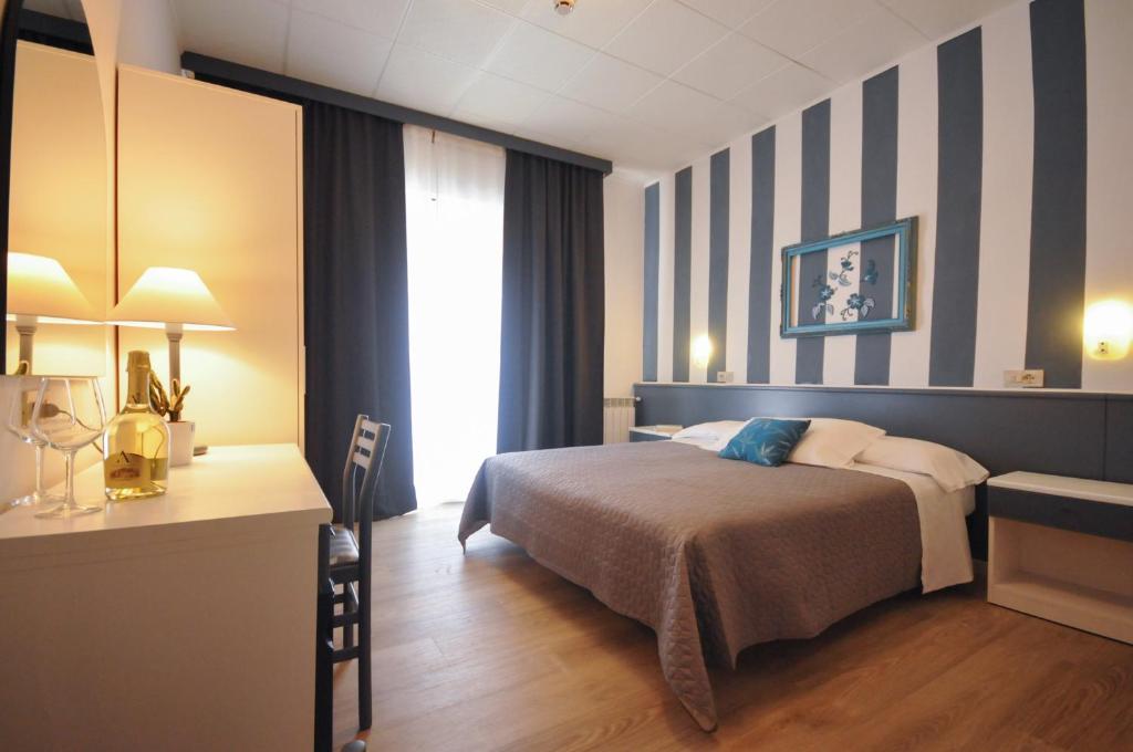 Postel nebo postele na pokoji v ubytování Hotel Crystal