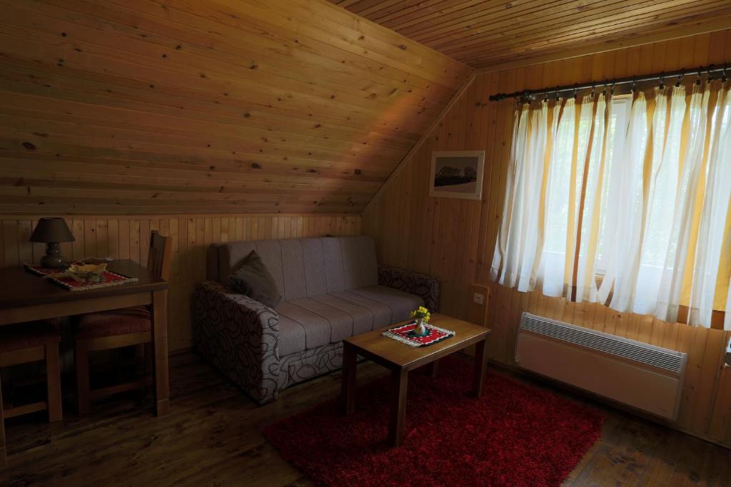 Posezení v ubytování Apartments Peaks