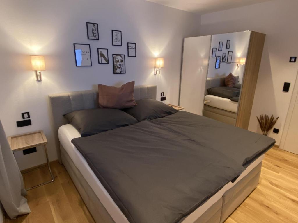 Postel nebo postele na pokoji v ubytování Seereith Apartments
