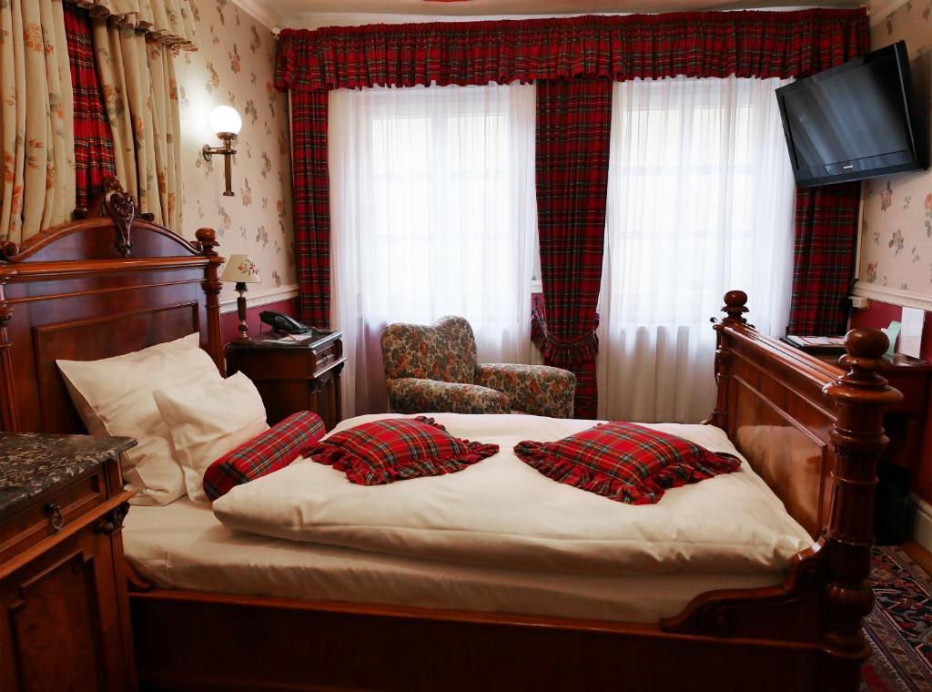 Postel nebo postele na pokoji v ubytování Hotel Goldener Anker