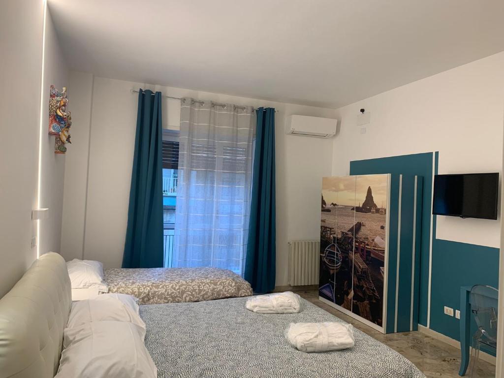 Posteľ alebo postele v izbe v ubytovaní Catania Apartment Borgo Suite Autonomous