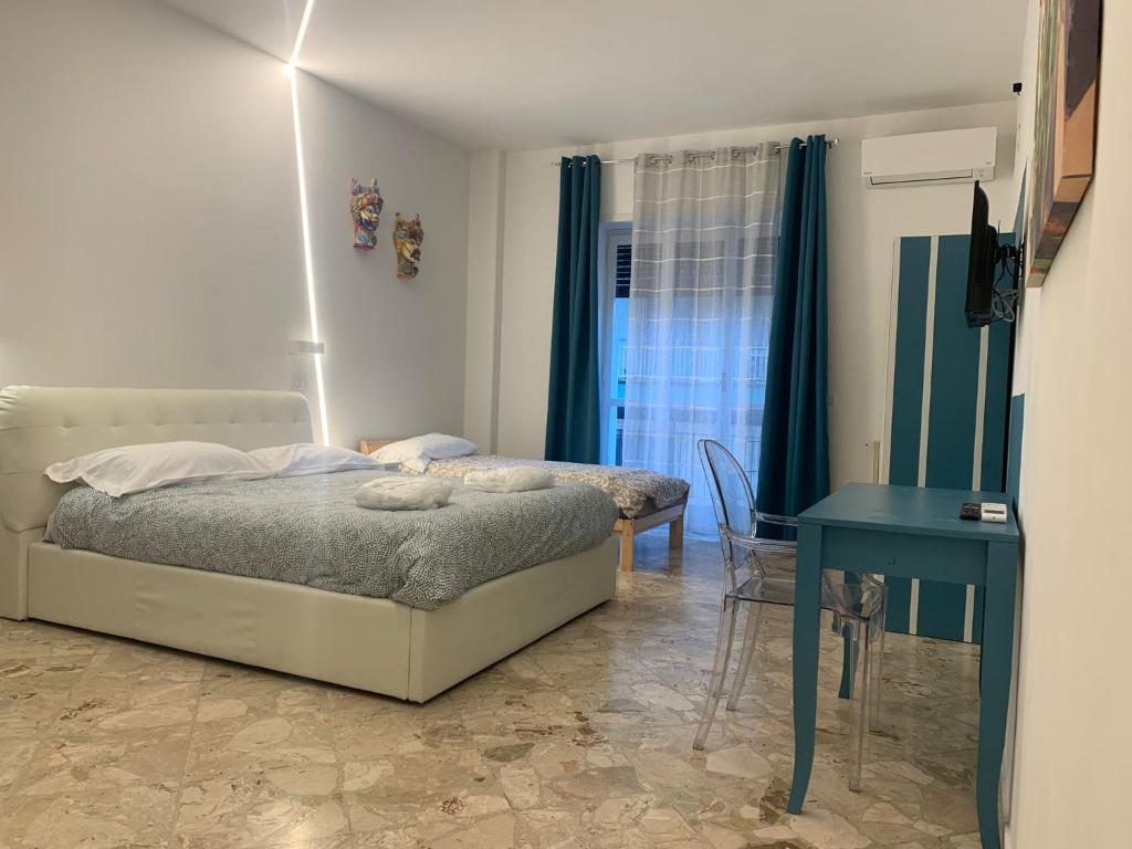 Posteľ alebo postele v izbe v ubytovaní Catania Apartment Borgo Suite Autonomous