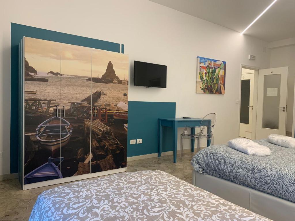 Posteľ alebo postele v izbe v ubytovaní Catania Apartment Borgo Suite Autonomous