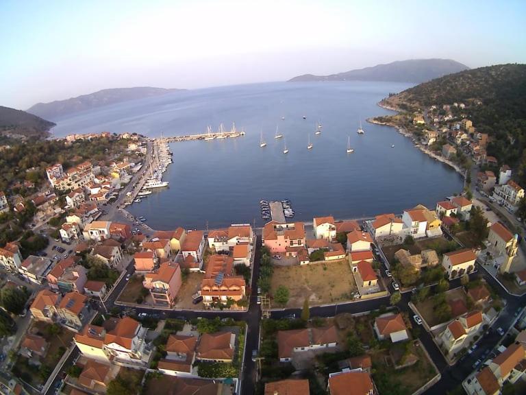 an aerial view of a harbor with boats in the water at Dionisis Apartments in Ayia Evfimia