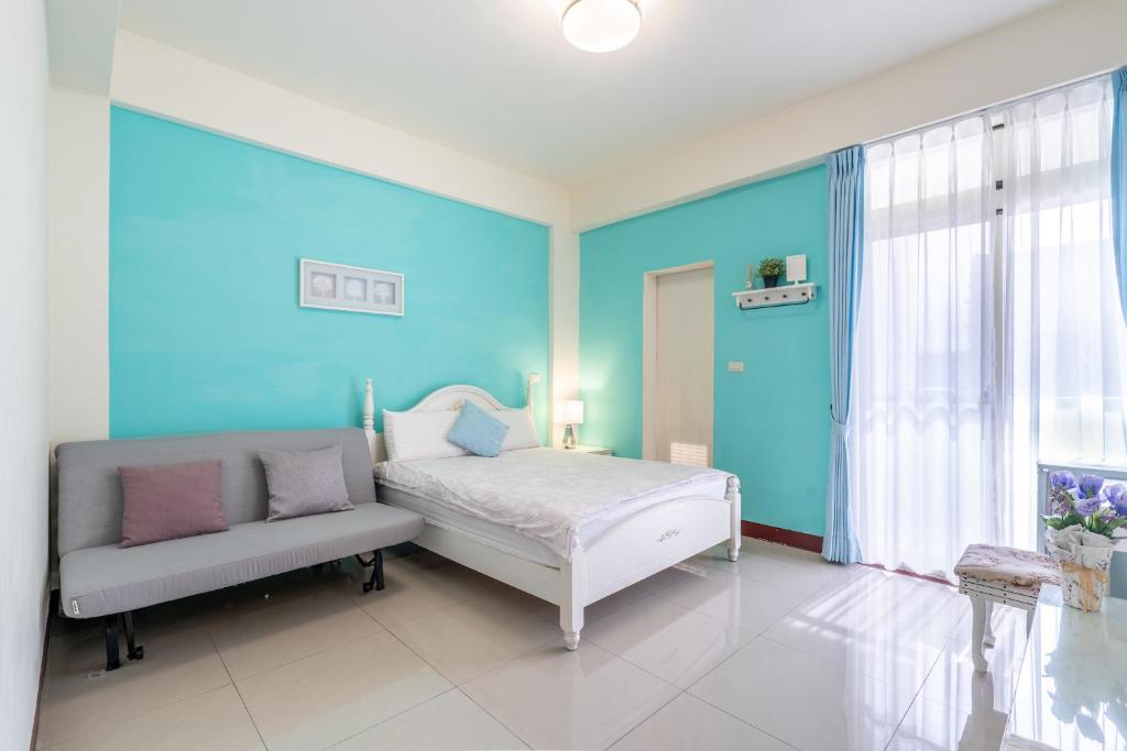 Postel nebo postele na pokoji v ubytování Happy Stay Inn