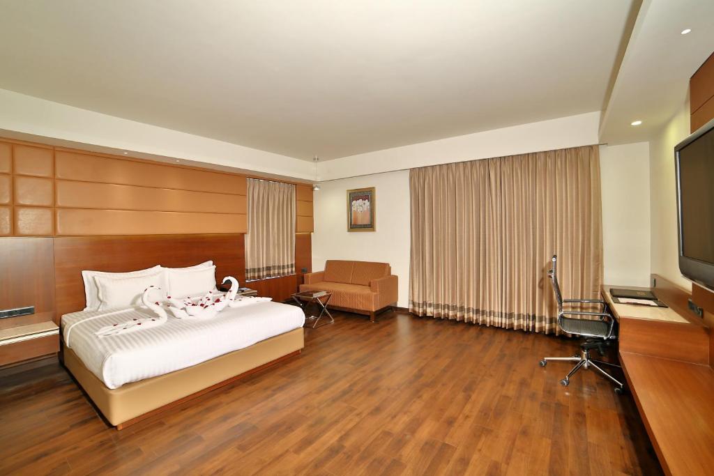 Postel nebo postele na pokoji v ubytování HOTEL G EXPRESS Formerly Known as TGB Express