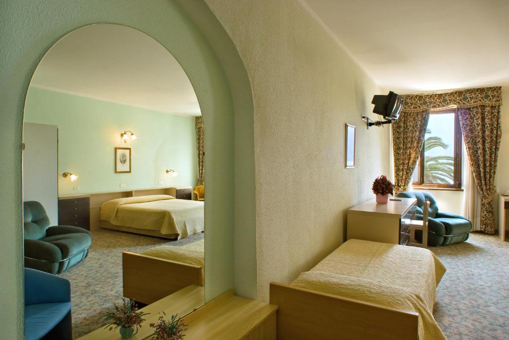 Postel nebo postele na pokoji v ubytování Albergo Bellavista