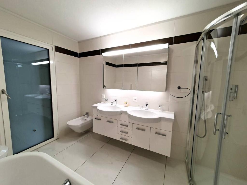 Kupatilo u objektu Residenza Vivian Deluxe Apartments