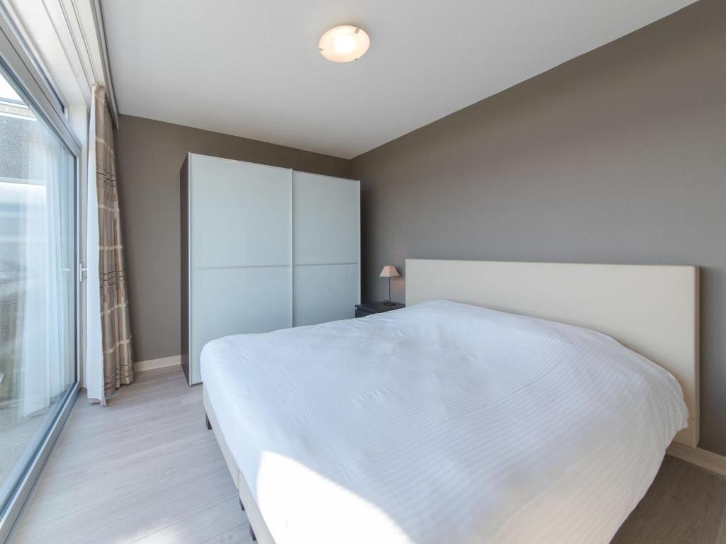 Postel nebo postele na pokoji v ubytování Apartment Astrid 64-902 by Interhome