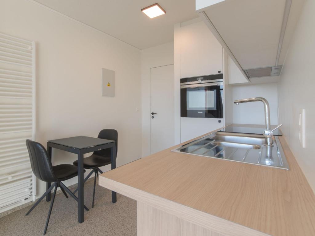 Kuchyň nebo kuchyňský kout v ubytování Studio Astrid 66 - 802 by Interhome