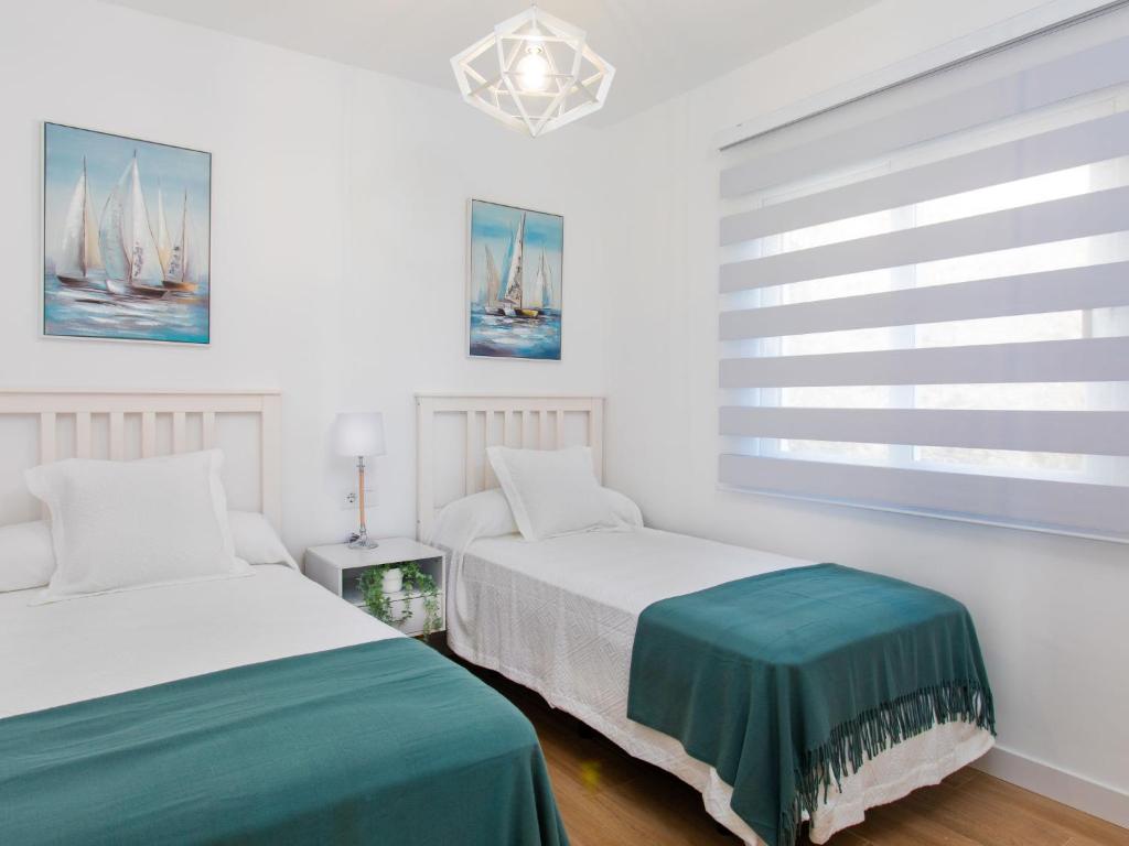 Posteľ alebo postele v izbe v ubytovaní Holiday Home Mediterraneo by Interhome