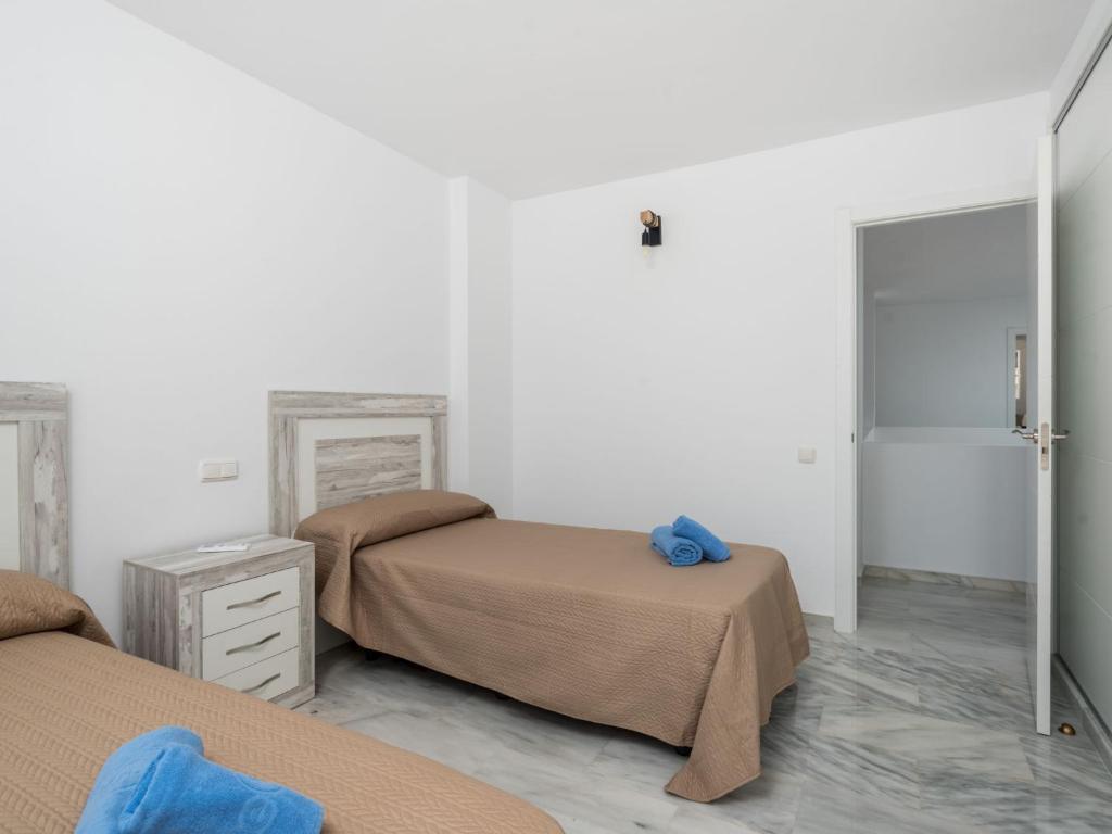 Posteľ alebo postele v izbe v ubytovaní Holiday Home La Palmera by Interhome