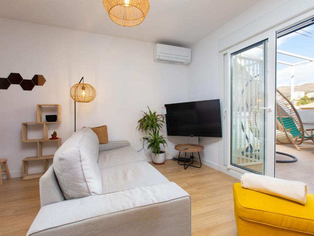 Televízia a/alebo spoločenská miestnosť v ubytovaní Apartment Constitución Square by Interhome
