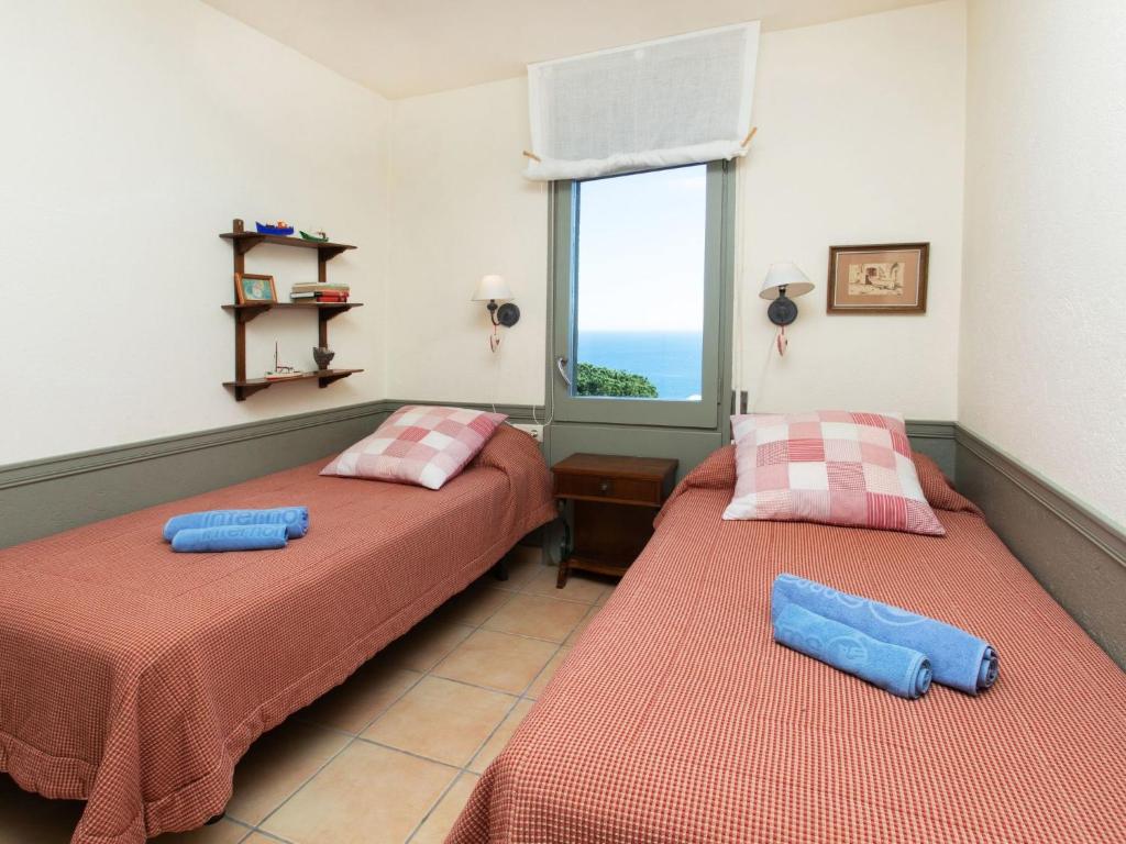 Postel nebo postele na pokoji v ubytování Apartment Chelo by Interhome