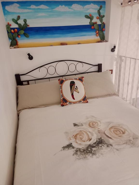 Łóżko lub łóżka w pokoju w obiekcie Casa Sicana